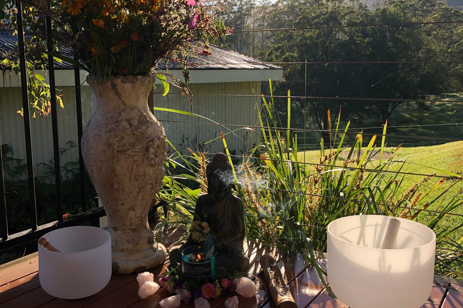 Mt Burrell Private Wellness Retreat 4 Statue of Buddha with crystals on sunrise | Wellness Retreat Image Haven Yoga & Meditation