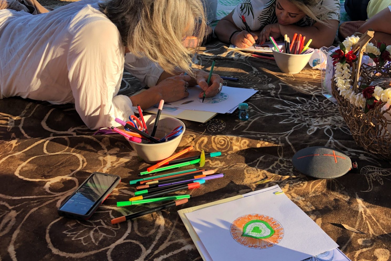Mt Burrell Private Wellness Retreat 11 Group of people on grass drawing in paper | Wellness Retreat Image - Haven Yoga & Meditation