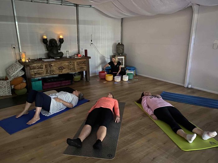 IMG_0121-scaled Women lying down - Wellness Day Retreat image