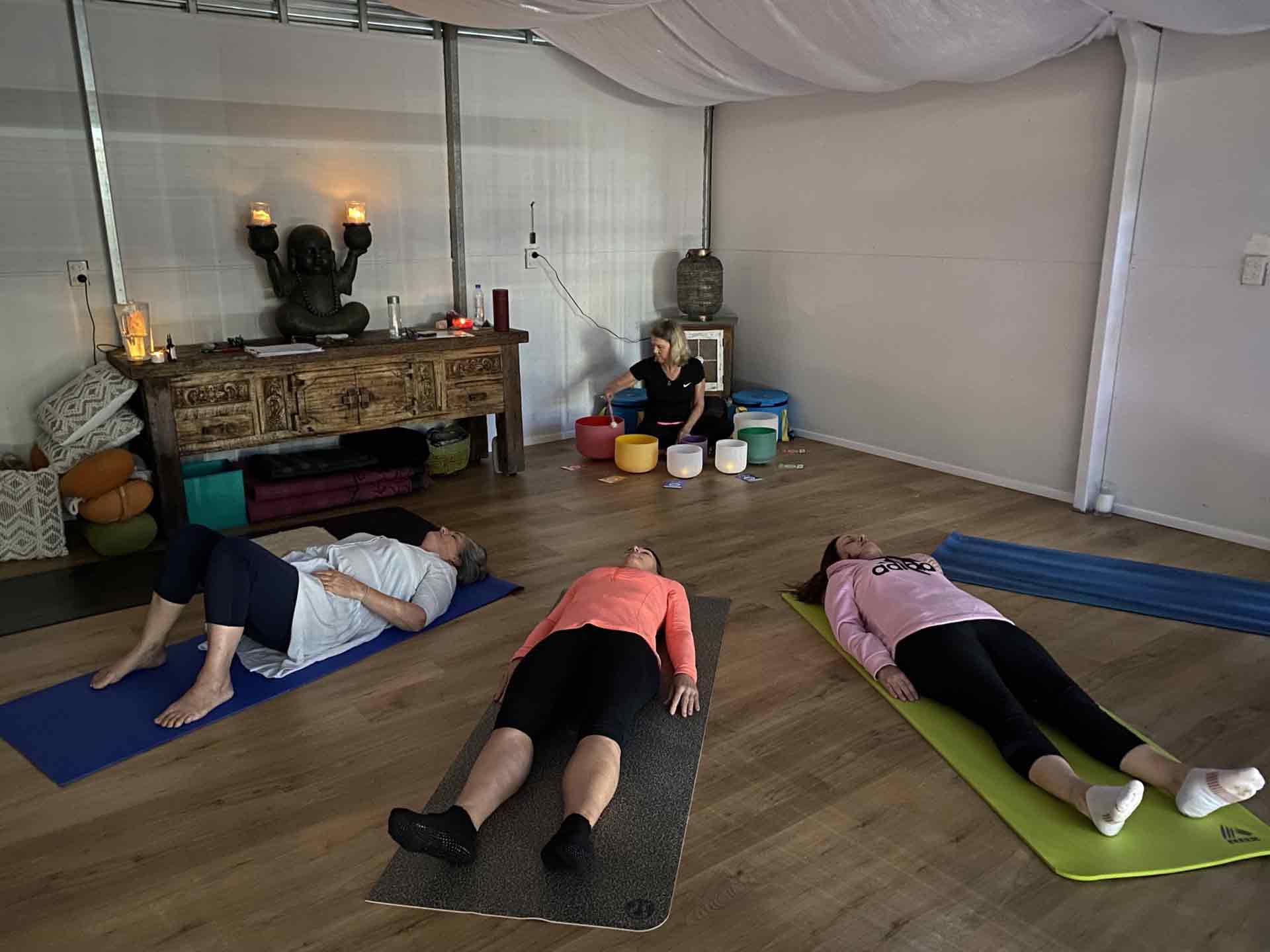 IMG_0121-scaled Women lying down - Wellness Day Retreat image