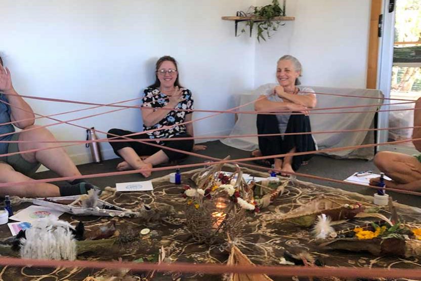 Mt Burrell Private Wellness Retreat 48 Group of Women Sitting in the Floor With Web Strings - Haven Yoga and Meditation MT Burrell Private Wellness Retreat