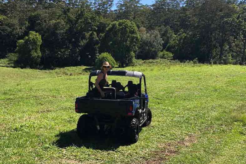 Mt Burrell Private Wellness Retreat 39 Woman Riding a Car in the Open Field - Haven Yoga and Meditation MT Burrell Private Wellness Retreat