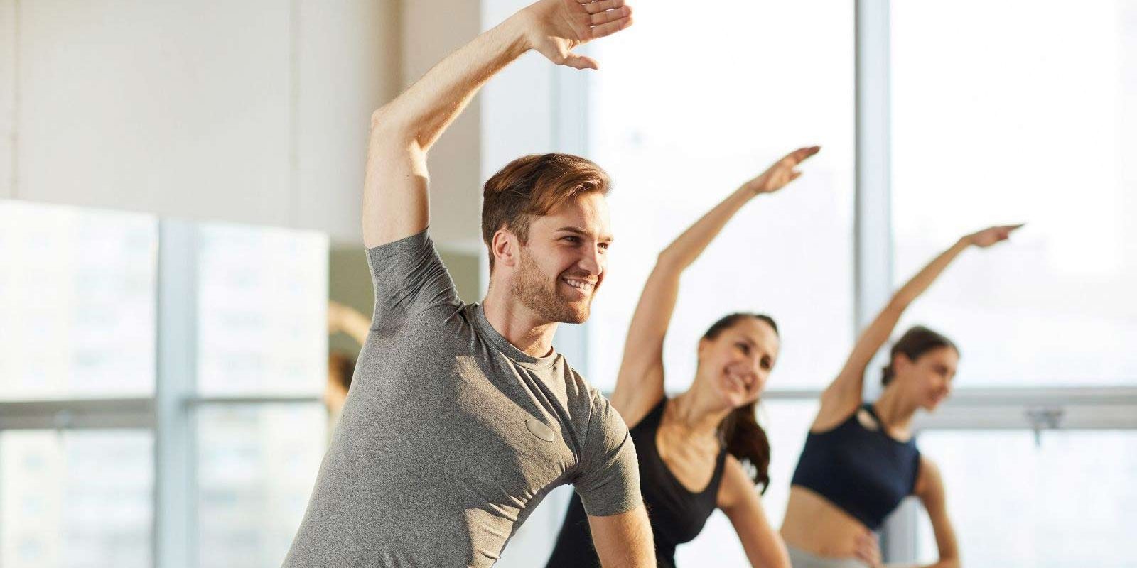 Men-Yoga Men and Group of Ladies Doing Yoga - Haven Yoga & Meditation Blog Image