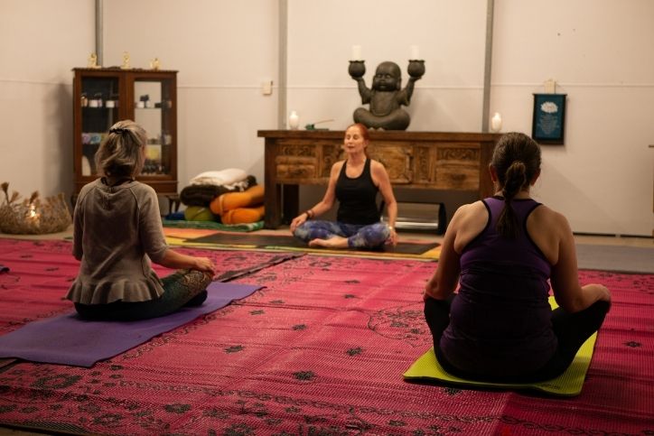 Jane Toohey in a yoga class session - Restorative Yoga image