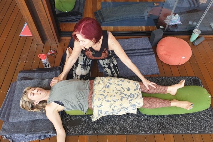 Jane Toohey assisting a student - Private Yoga Classes Brisbane image