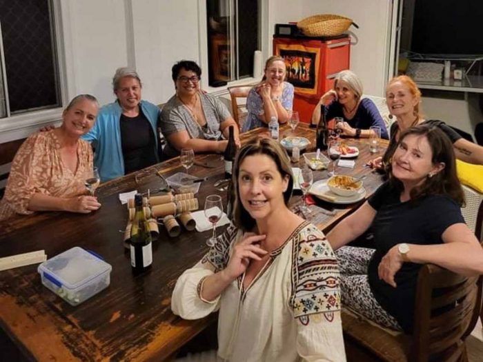 Community-Yoga A group photo of women in a yoga community - Haven Yoga and Meditation Blog Image
