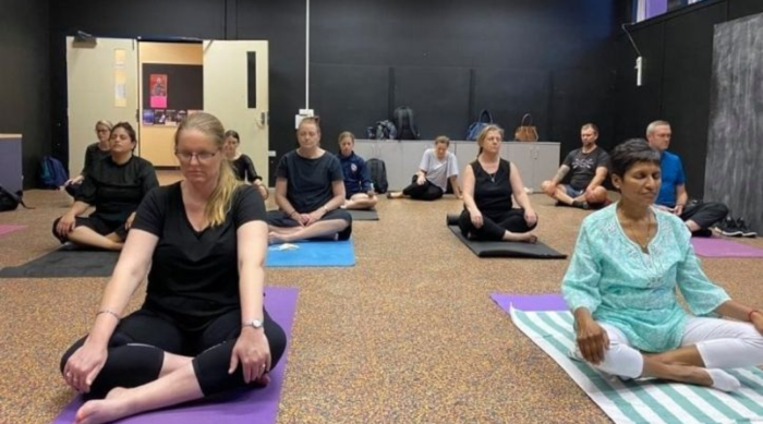 EOFY Mindfulness Post Corporate employees doing yoga - Haven Yoga and Meditation