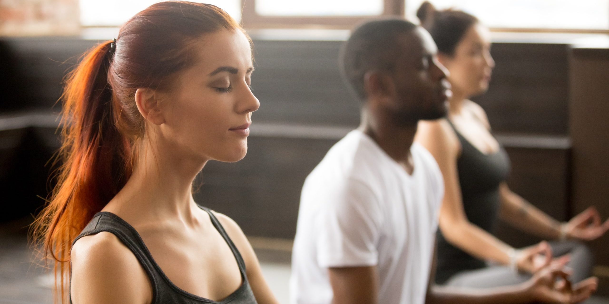 mindfulness activities brisbane group of young people meditating | Haven Yoga Blog Image