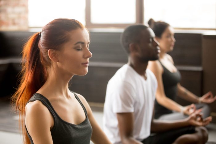 mindfulness activities brisbane group of young people meditating | Haven Yoga Blog Image